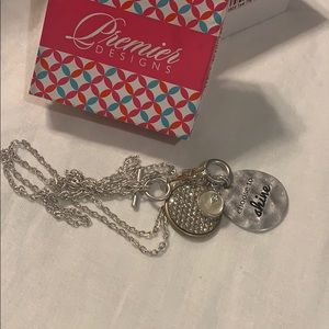 Long silver necklace gold detail